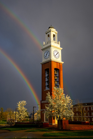 The south end of a double rainbow appears to end at the Pulley Tower.