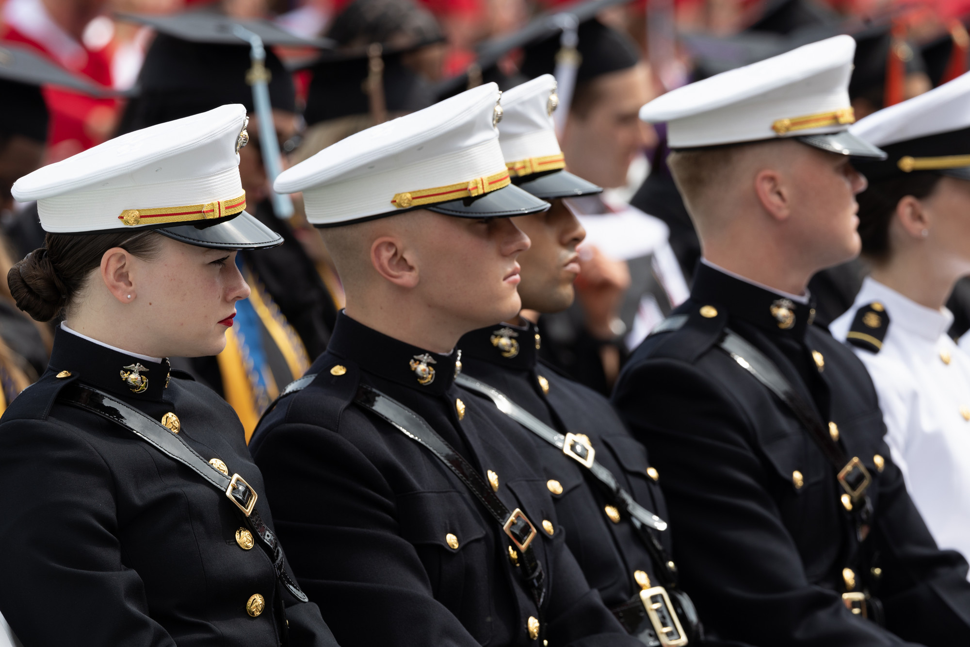 ROTC students sit at attention during their graduation ceremony.