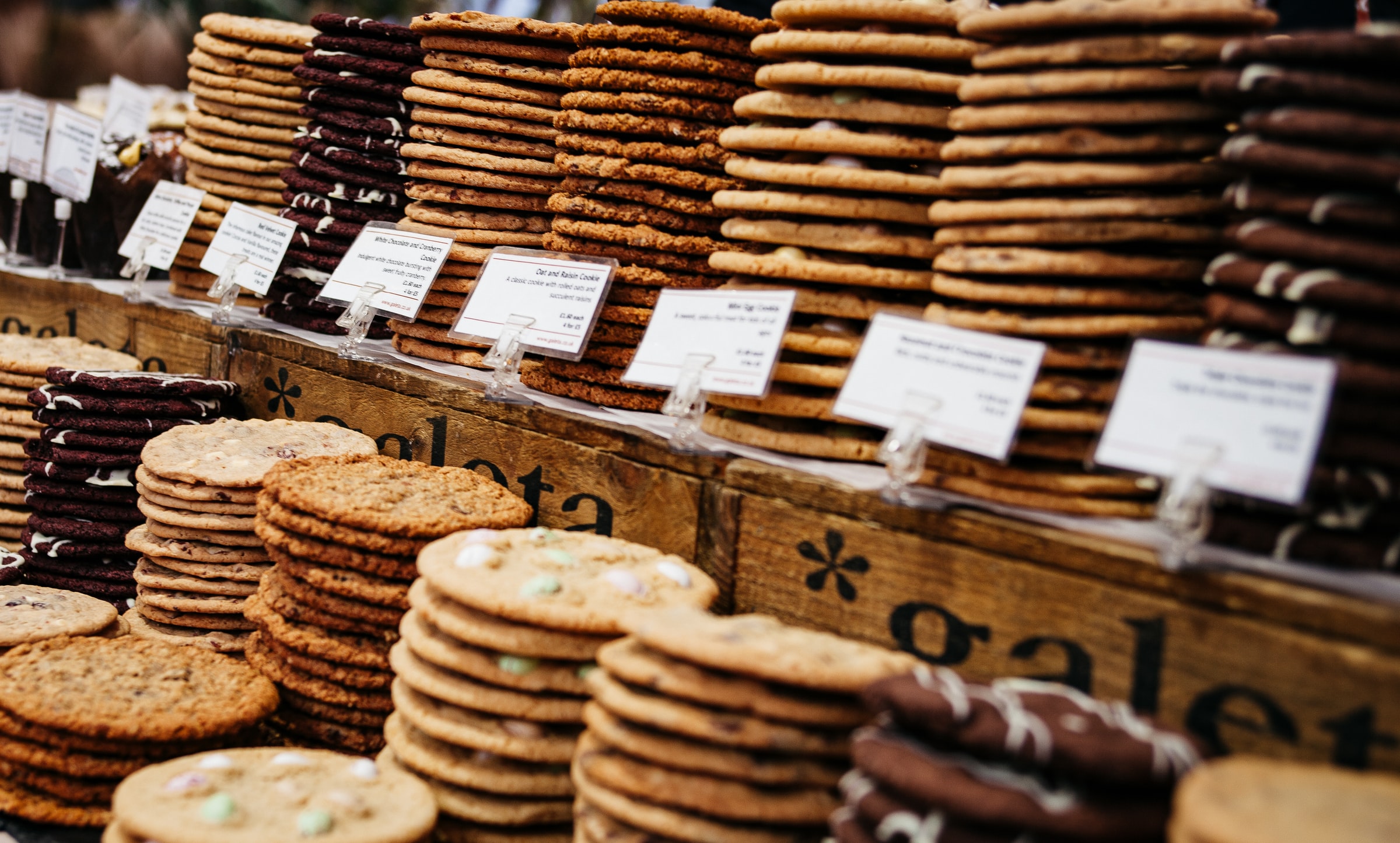 Many stacks of different kinds of cookies
