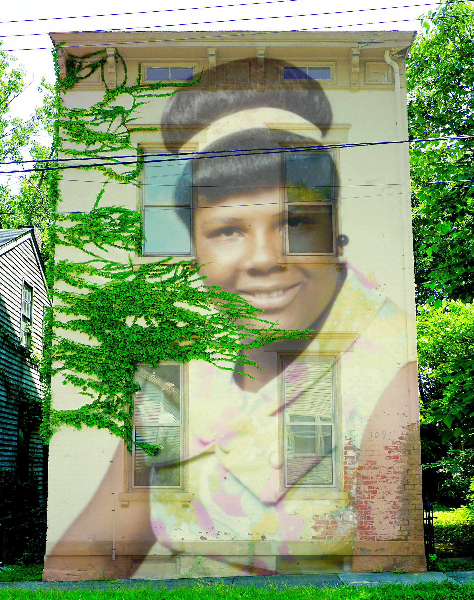 Childhood photo transposed atop current houses in a neighborhood