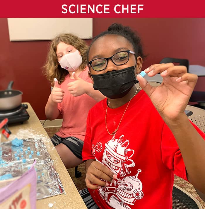 Science Chef; a student shower her edible creation