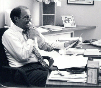 Lynn Darbyshire at his desk