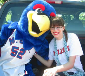 Christyn New is pictured with Flash, Miami Middletown’s mascot, at the Fourth of July parade in 2014.