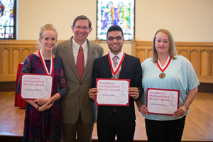 From left to right: Emily Johnson, President David Hodge, Jaree Naqvi, and Debi Ellenburg