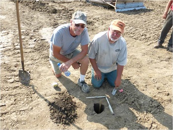 Ken (right) at excavated post mold hole which indicates the location of Peter Loramie’s trading post