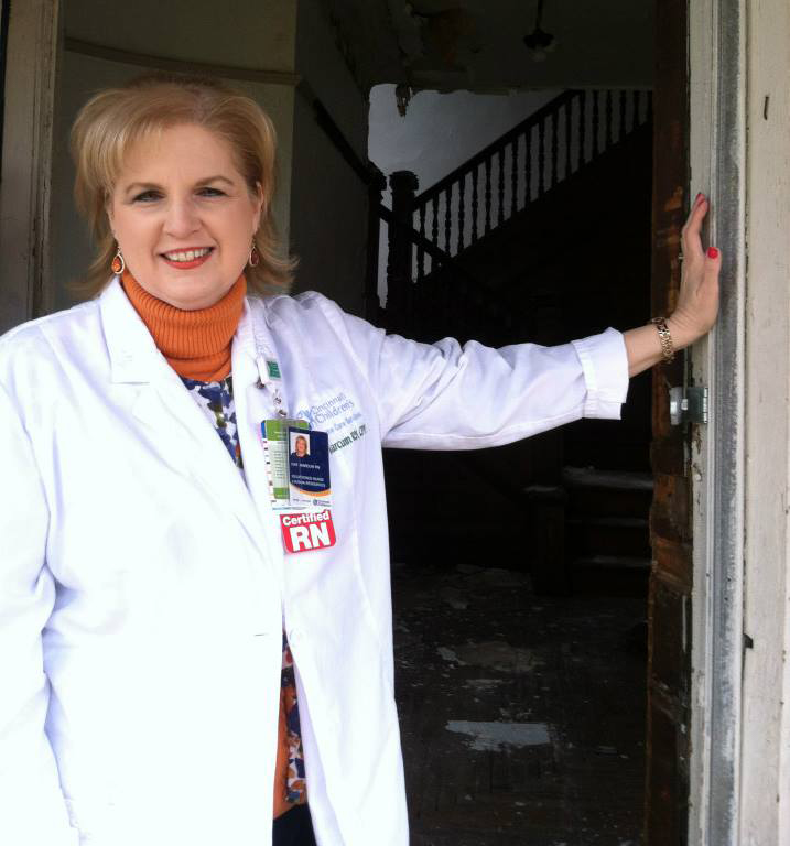 Photo of Kim Marcum with her nursing uniform on.
