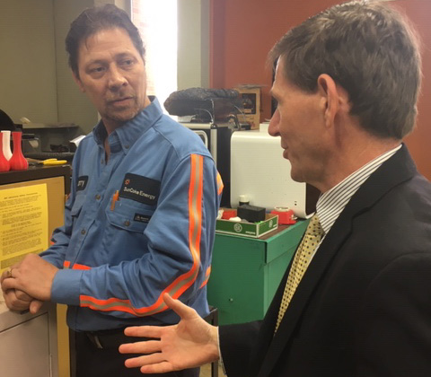 ENT student Larry Gardner, an AK Steel employee, talks 3D printing with John Magill, assistant vice chancellor of the Ohio Department of Higher Education.