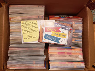 1,000 postcards in a card board box