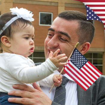 A father with his daughter celebrating becoming a US Citizen