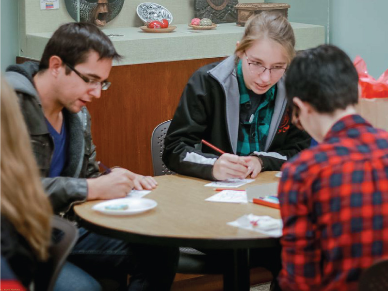 Students working at a table in the Center for Diversity