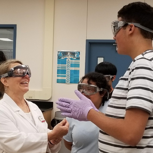 Students do experiments in a Biology Lab.