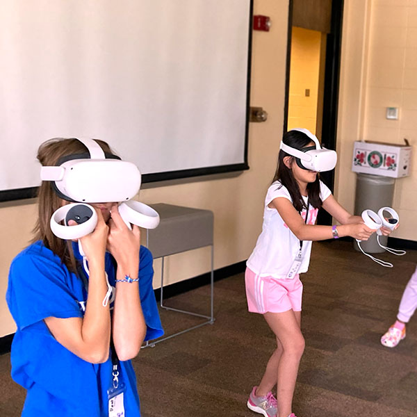 Young women using virtual reality games