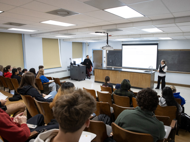 Naija Ahmed speaking to a class.