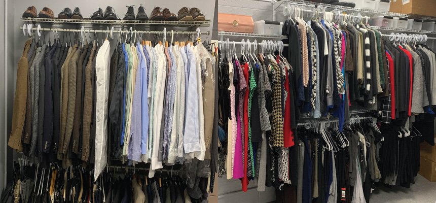 Clothes hanging on racks in the professional clothing closet on the Middletown campus. 