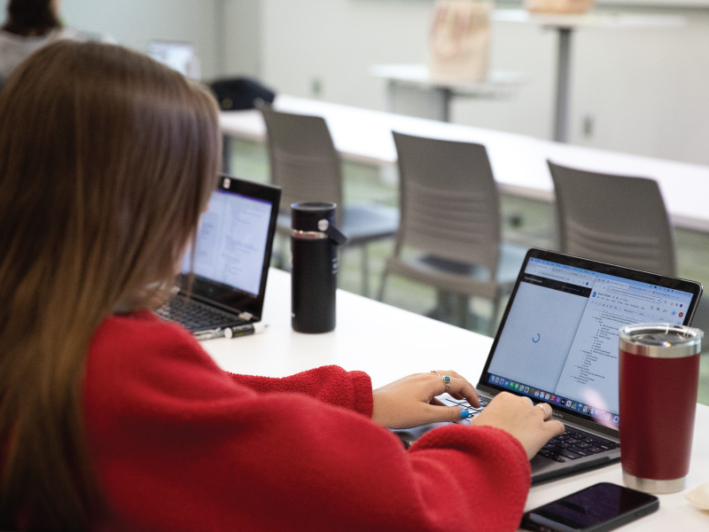 Student working on a laptop.