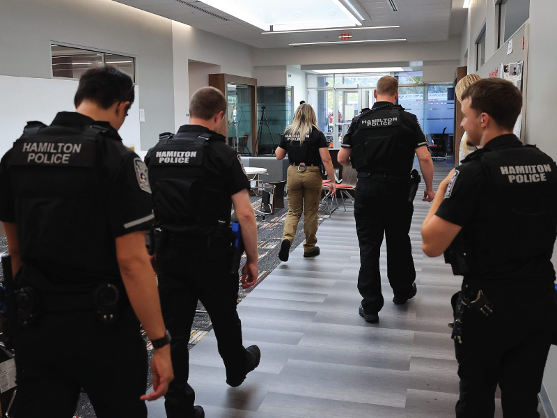 A group of police officers walking together.