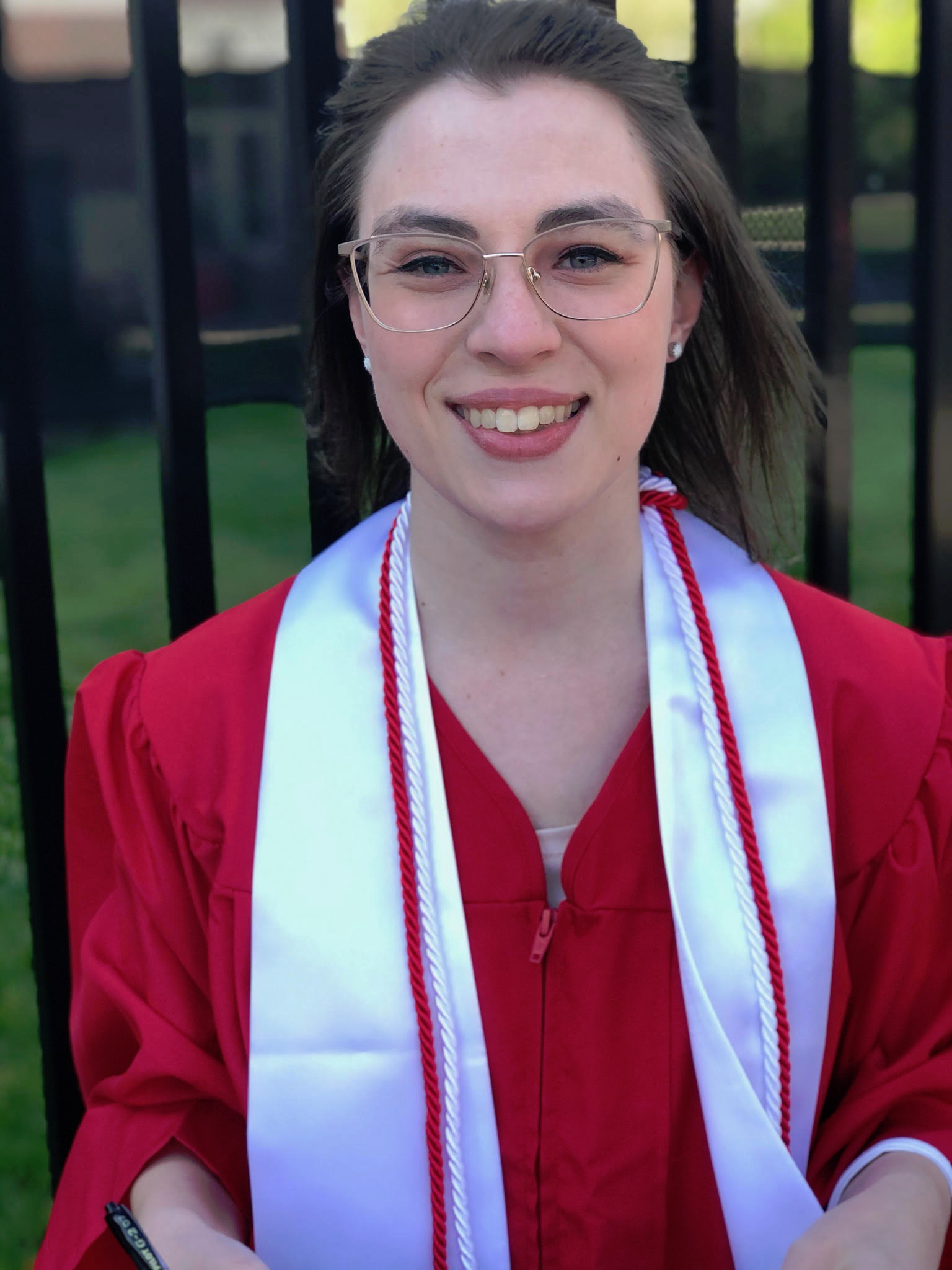 Brianna Stoll in graduation gown