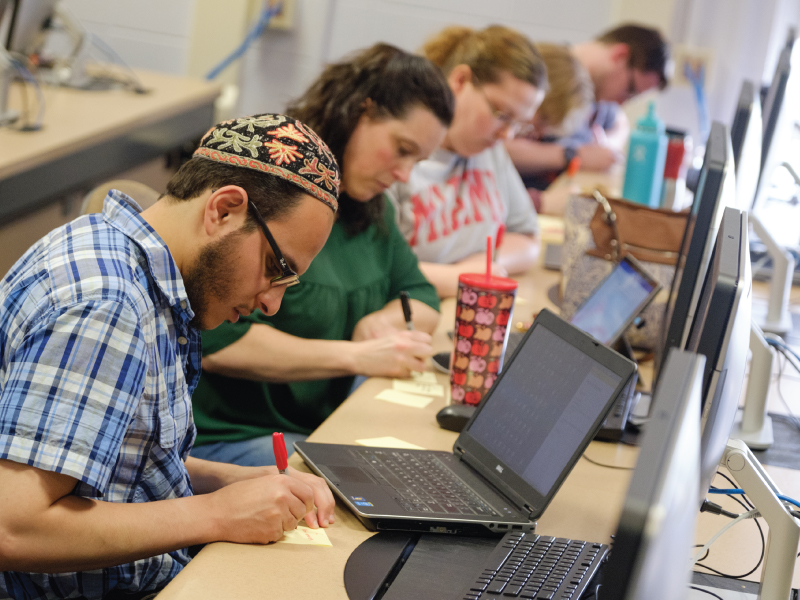 Students working in a computer lab. 