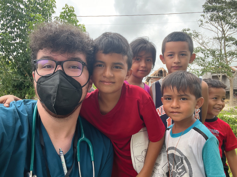 Max Kelly and neighborhood children in Belize.