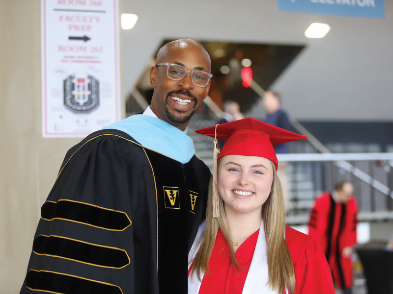Mallory Getz and Ande Durojaiye, vice president of Miami Regionals and dean of the College of Liberal Arts and Applied Science
