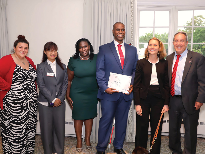 Miami University faculty and staff pose with Quan Leysath, grand prize winner of the 2026 Business Enterprise Competition, and staff from the Forsythe Entrepreneurial Center at The Chicago Lighthouse’s Forsythe Entrepreneurial Award Dinner in late June.