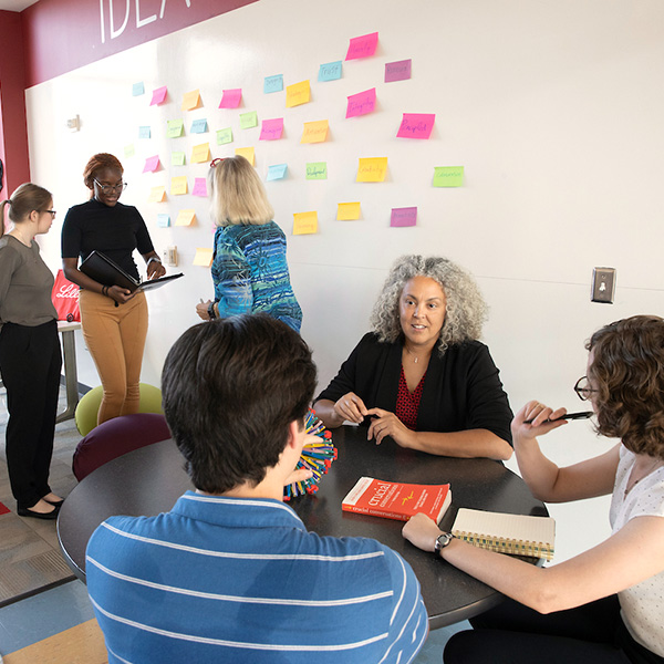 A group of people collaborating on a project using Agile principles