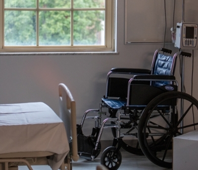 empty wheelchair and medical bed 