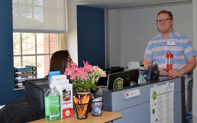 Learning Ambassador at the front desk of Rinella