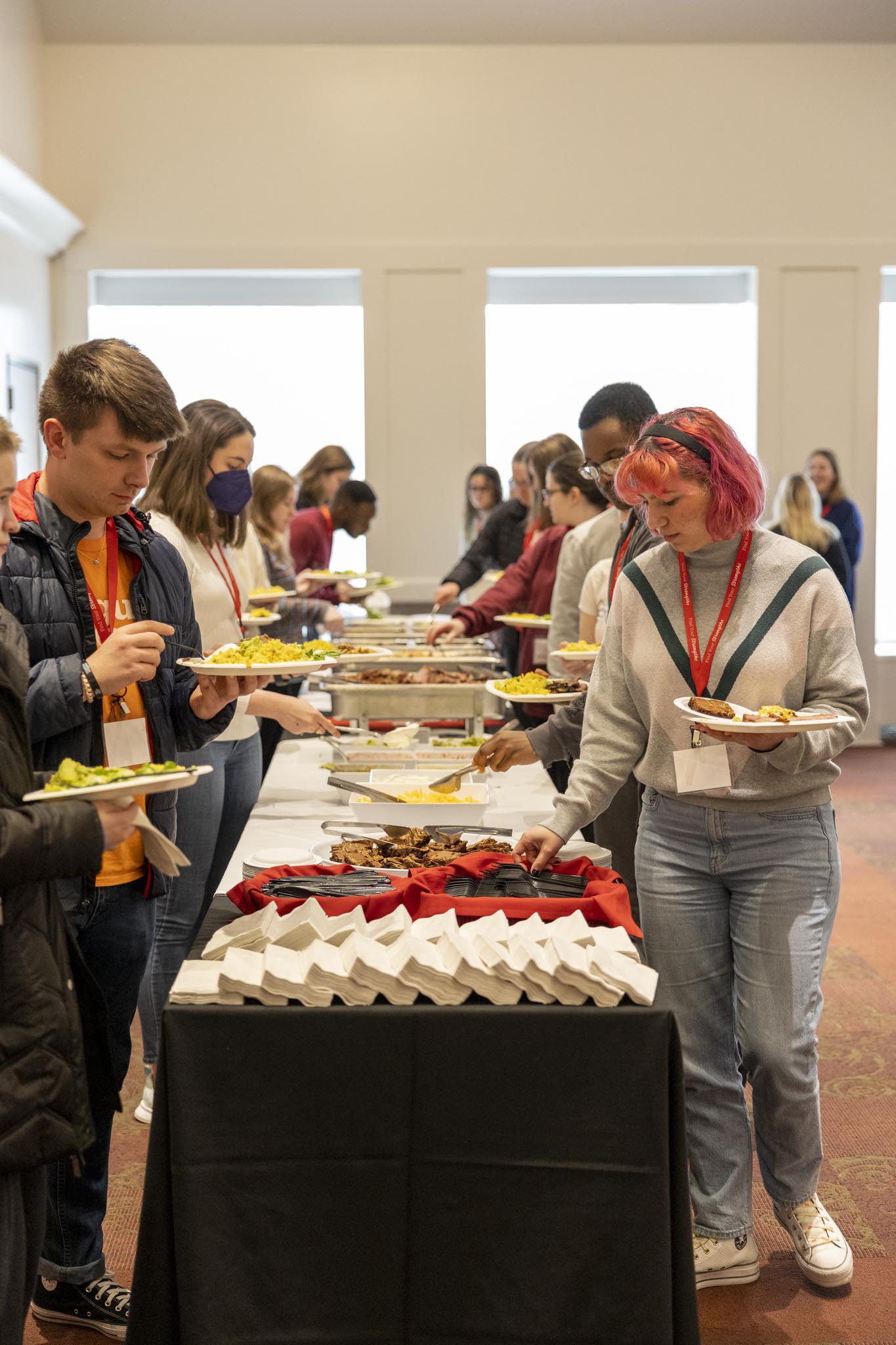 Students in line to get food at the Perlmutter Leadership Conference.