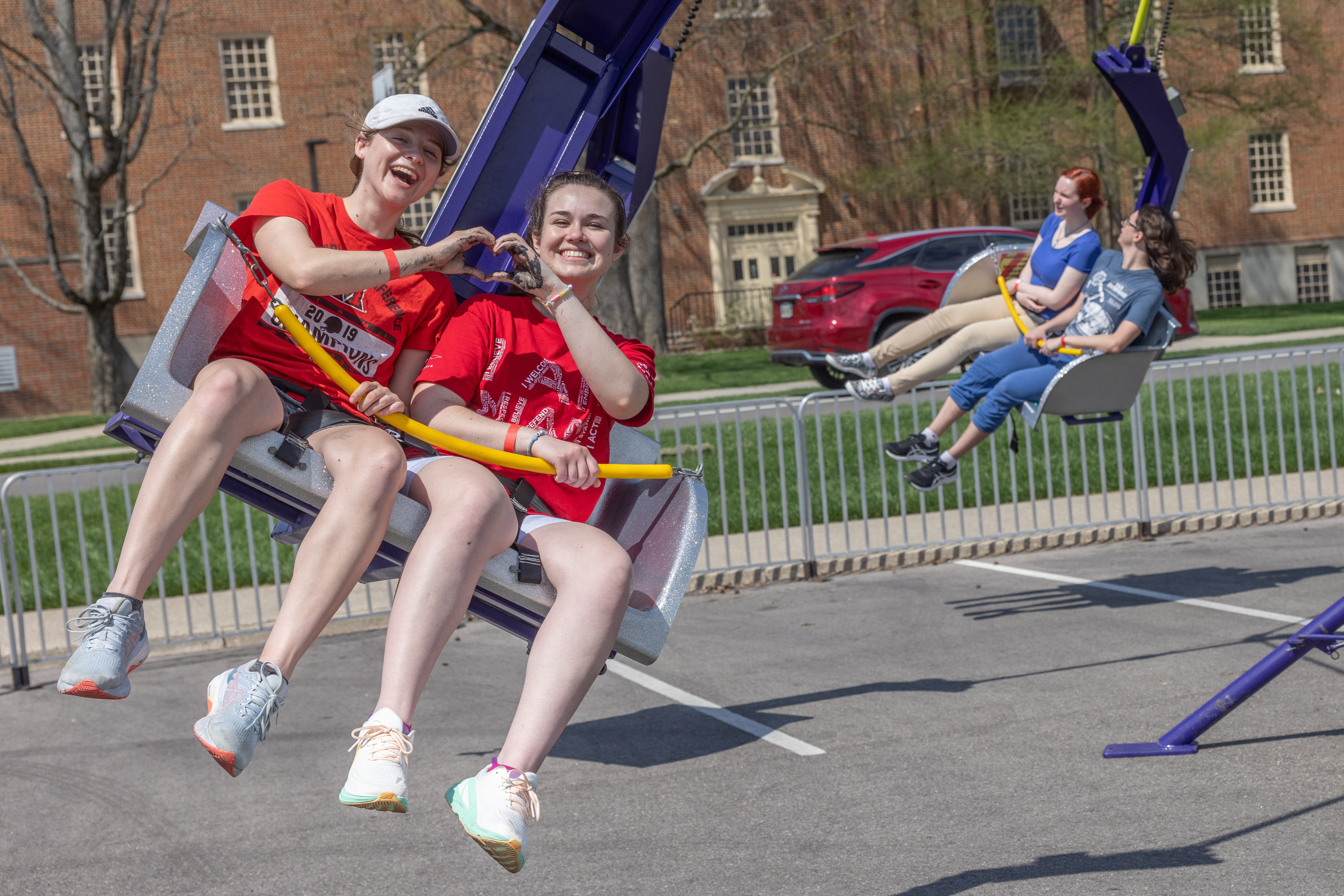 students on swing at springfest 2023
