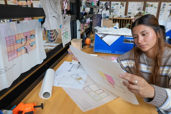 student studying a design