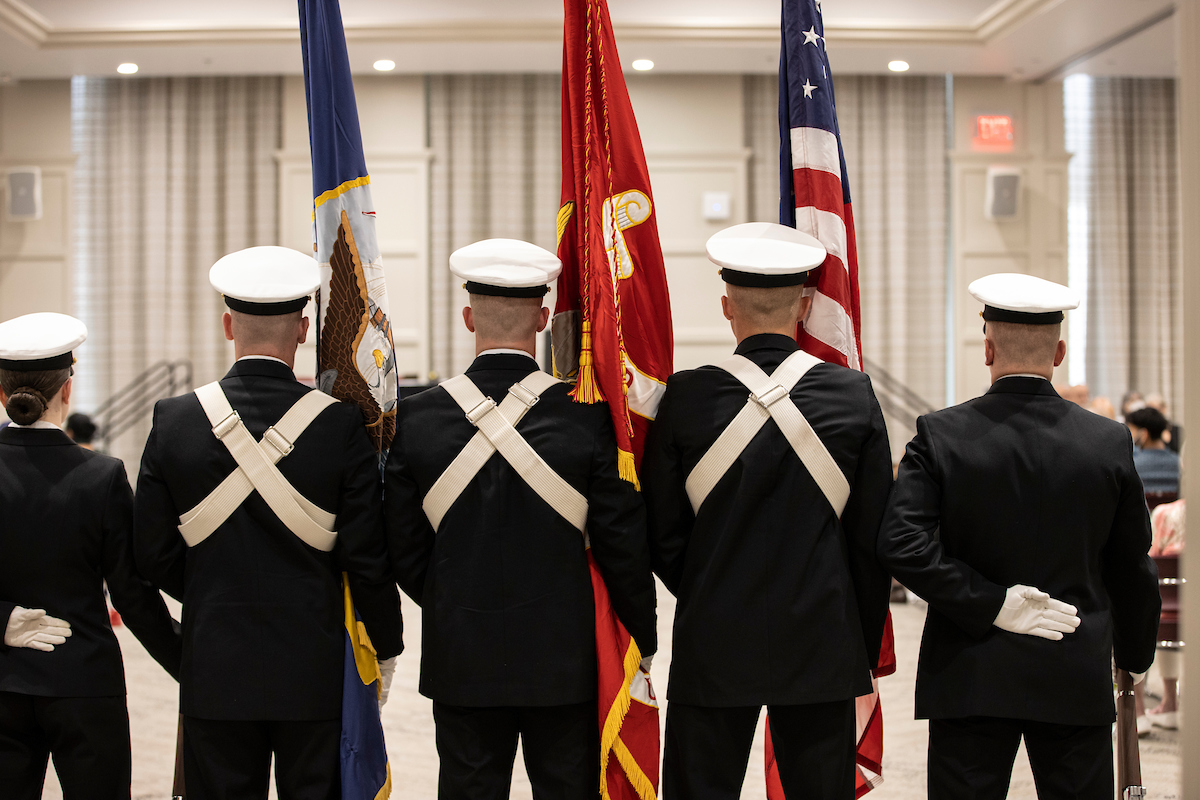 A Color Guard stands at attention during an event.