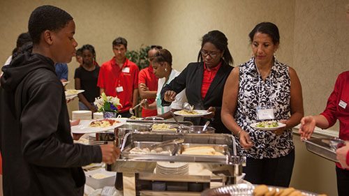 Event attendees enjoying Miami's on-campus catering