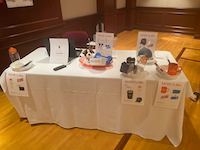 Welcome table at Workday kickoff event with raffle prizes