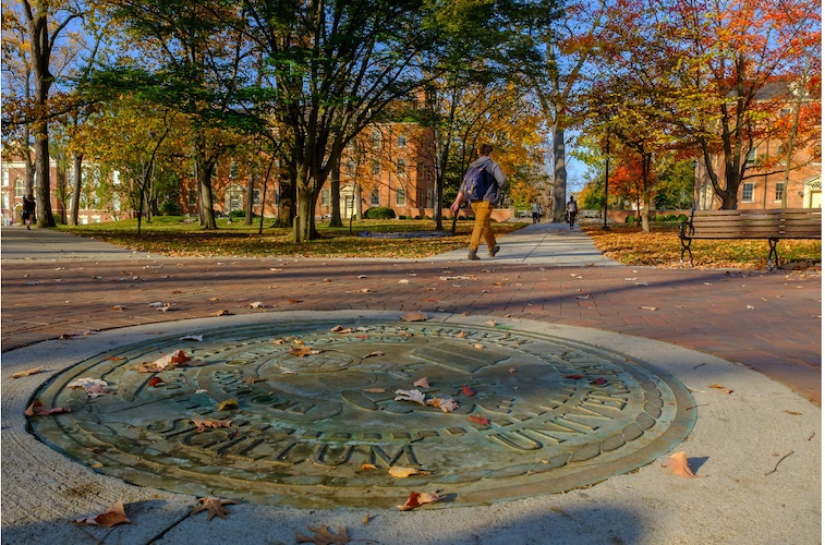 The bronze Miami University seal in the center of campus