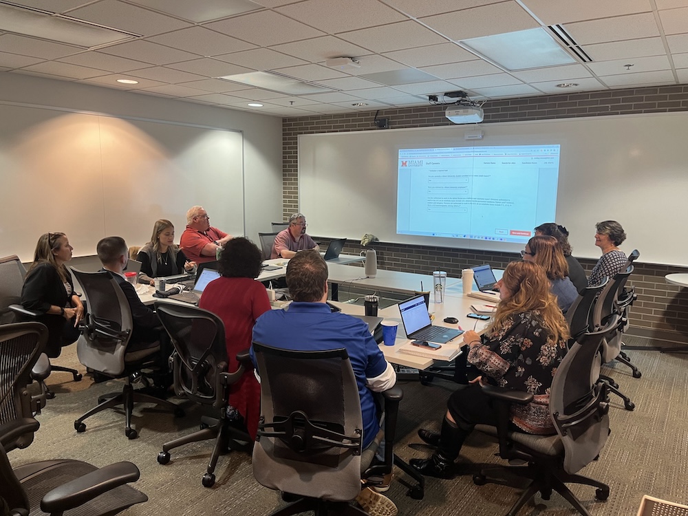 A group of unit testers in a conference room in Hoyt Hall