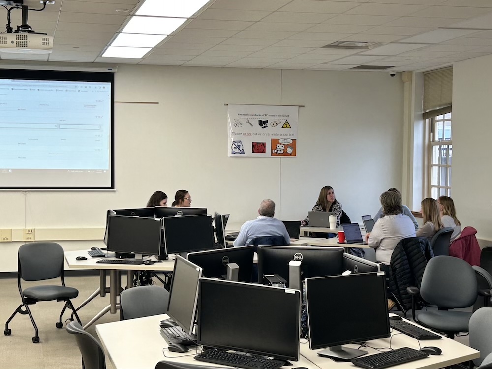 Workday testers meeting in a Benton Hall computer lab