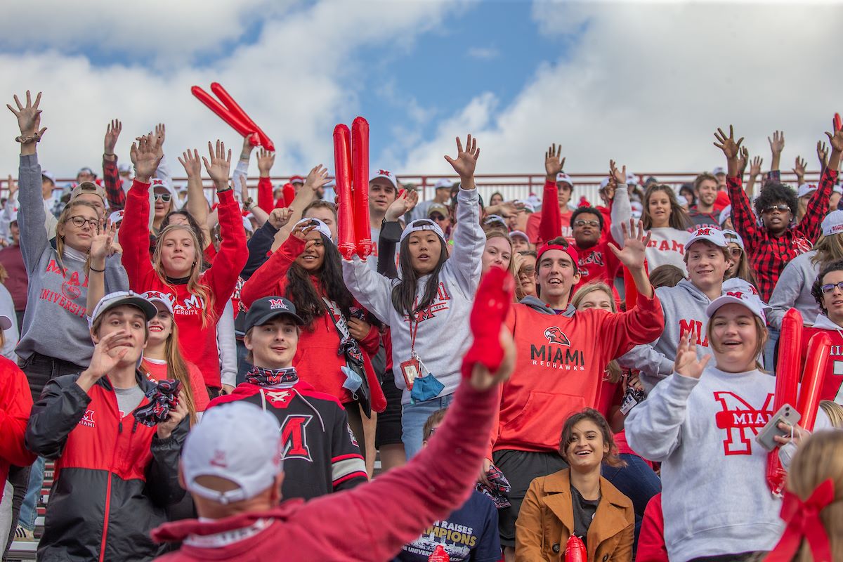 Miami RedHawks fans cheering at a football game