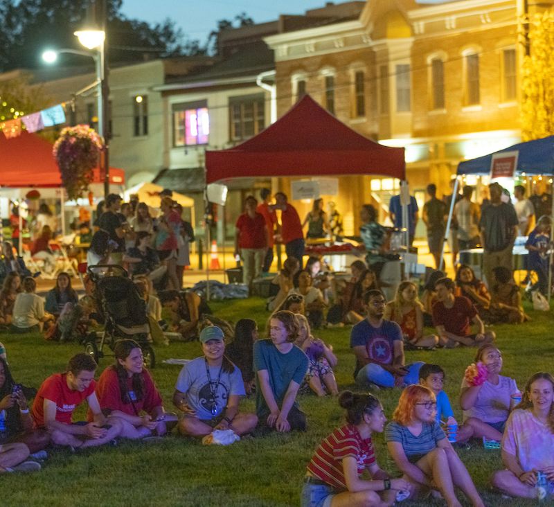 Students listening to a concert at the annual UniDiversity festival in Uptown Oxford